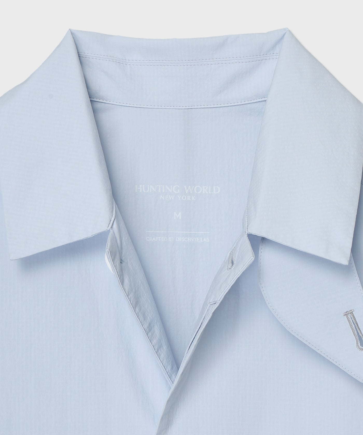 CRAFTED BY DESCENTE.LAB[リンクルリップストップ エアリーパッカブルコート SWB80M]ライトブルー 6235600260メンズ 9