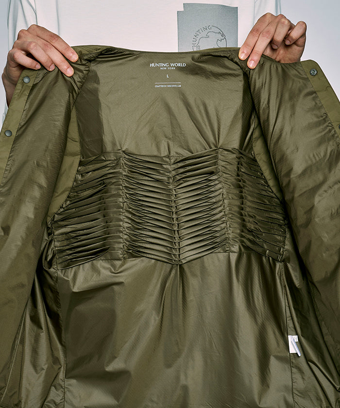 CRAFTED BY DESCENTE.LAB[ヒートナビ キルティングベスト FVE46M]オリーブ6234601146メンズ HUNTING WORLD